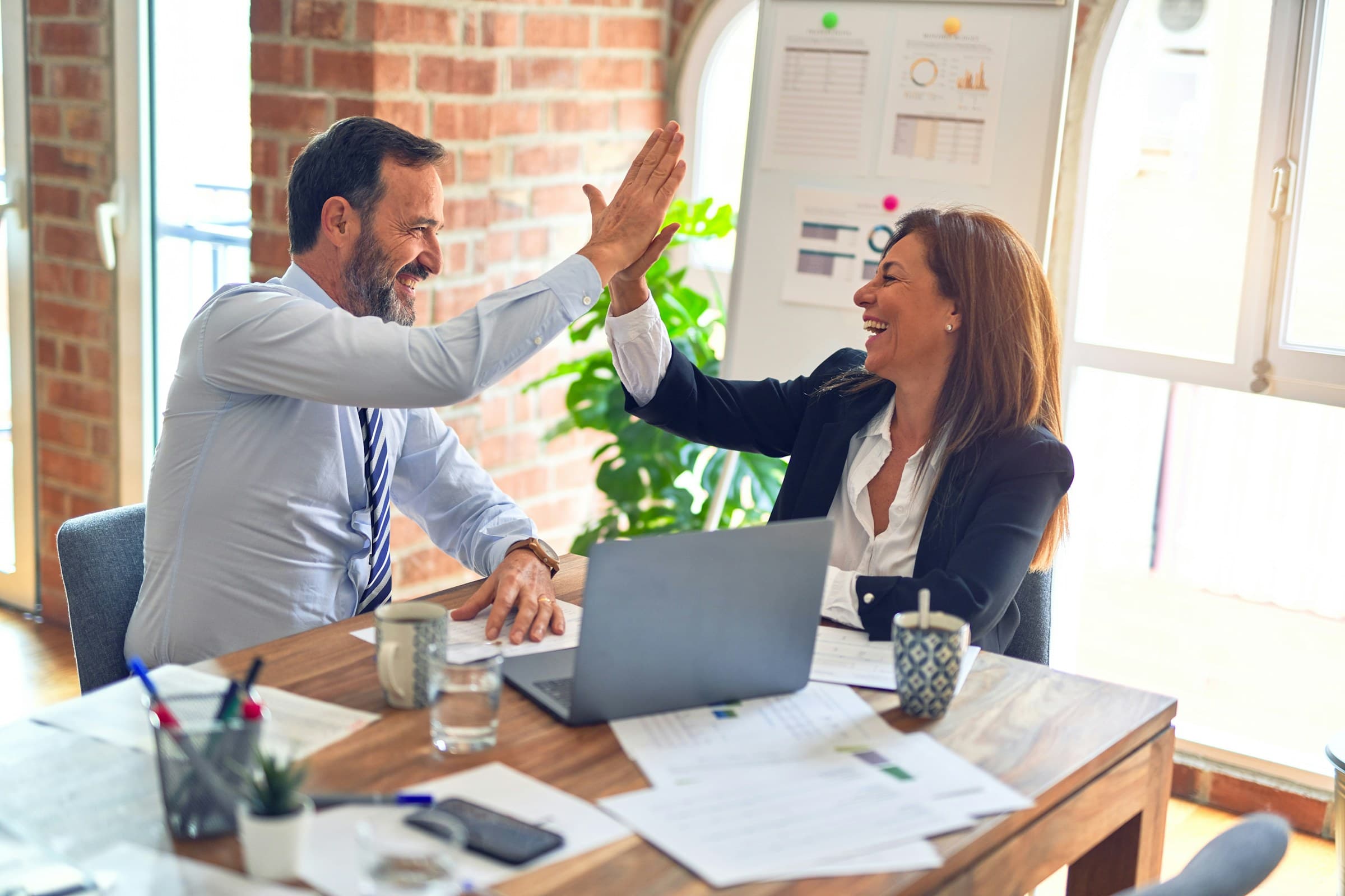 A SMAART Advisors consultant reviewing strategy with a client